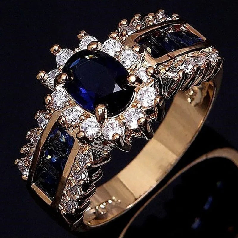 Zinc alloy fashion ring with diamond or zircon stone detailing in sunflower blue, square blue, or square purple designs.