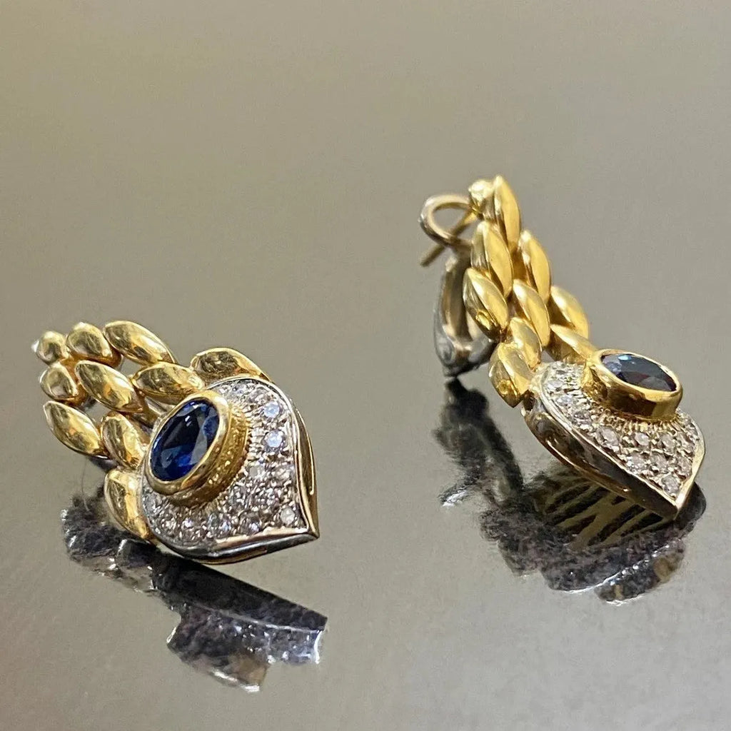 Pair of women's snake motif drop earrings in imitation gold with electroplated alloy finish