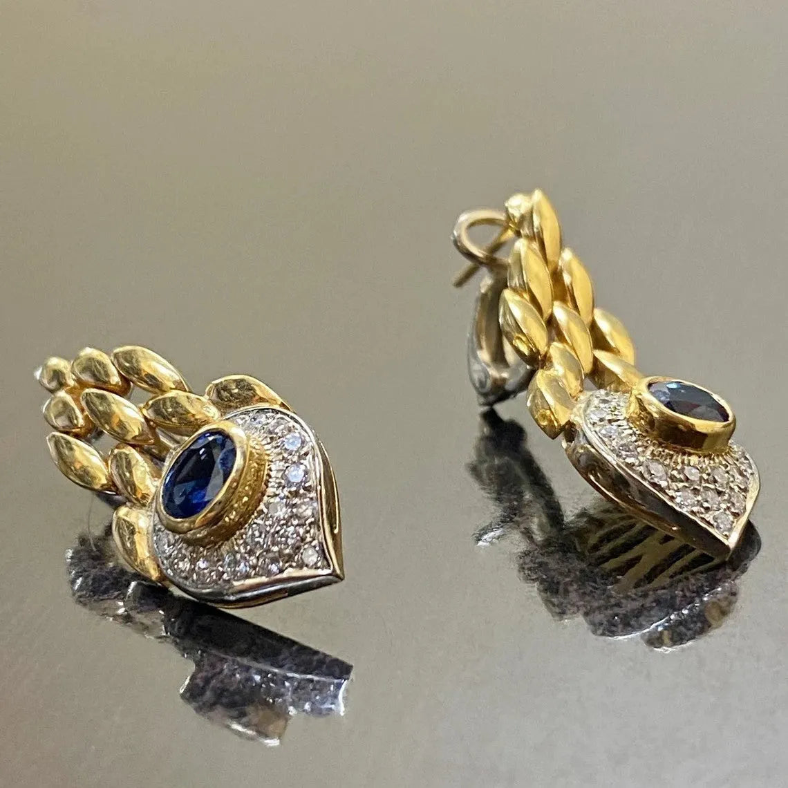 Pair of women's snake motif drop earrings in imitation gold with electroplated alloy finish