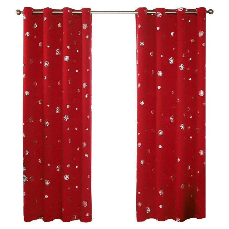 Red or green snowflake pattern shade cloth curtain with coordinating lace loops and iron hoops