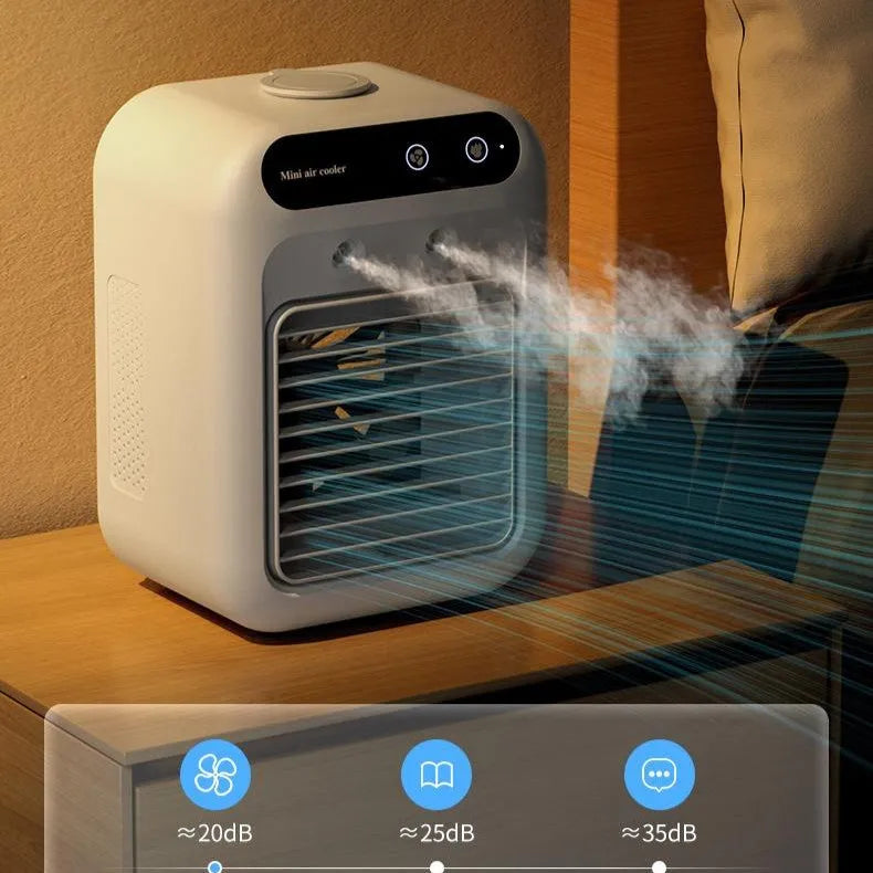 Ivory white portable air cooler with touchscreen panel and USB cable on a desk