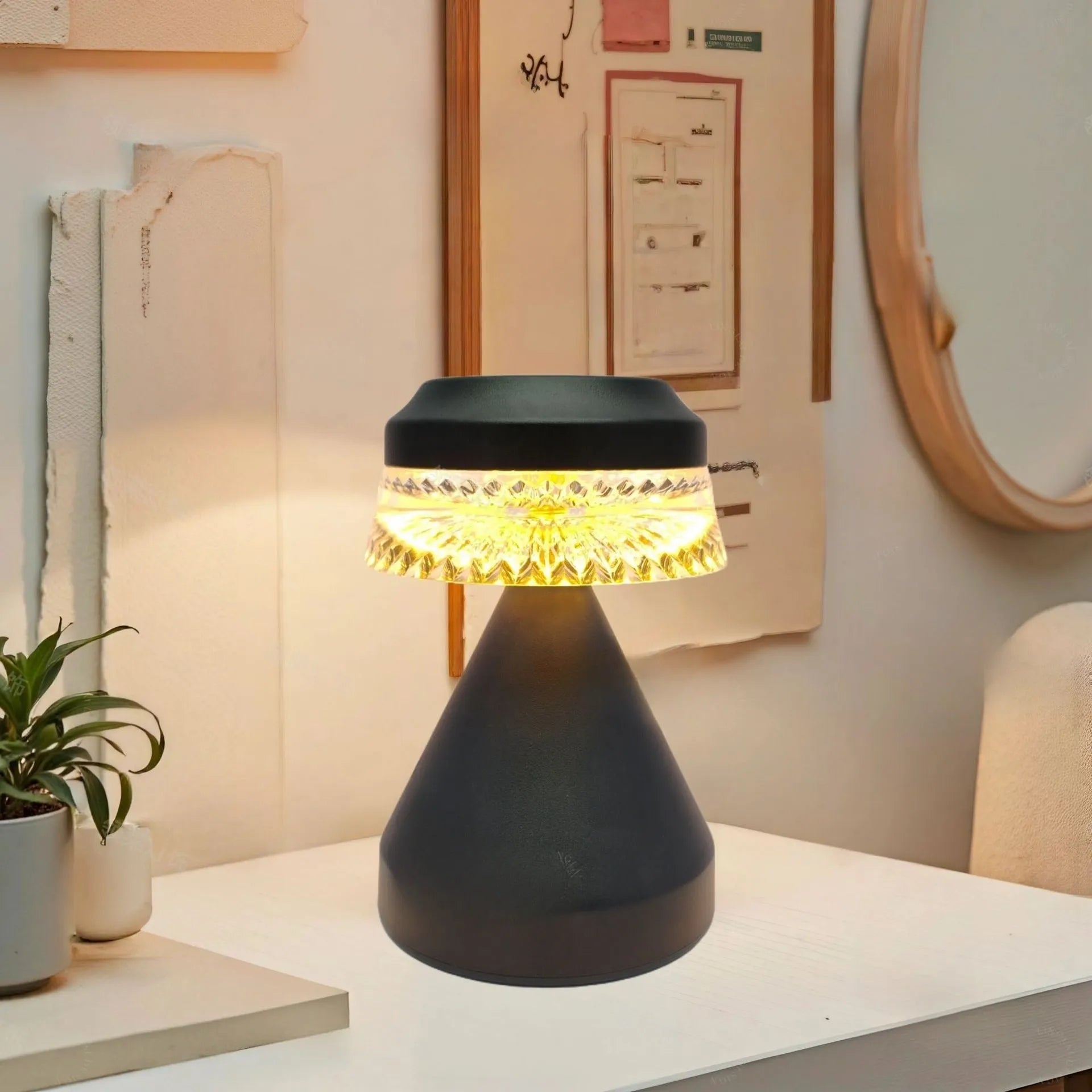 Compact USB rechargeable LED night light in black, brown, and orange colour options on a table.