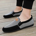 Men's grey and khaki canvas board shoes with round toe and rubber sole.