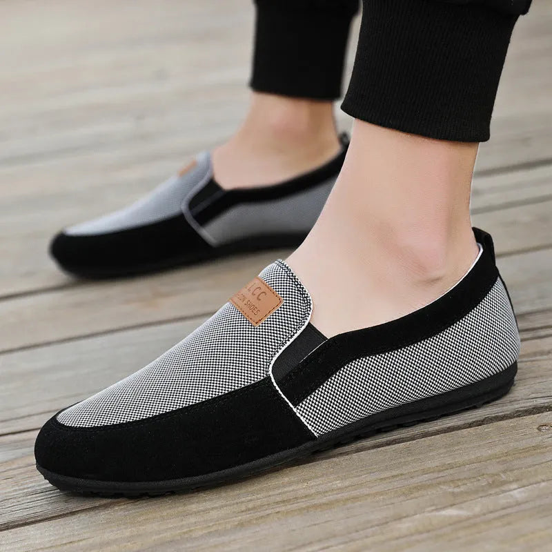 Men's grey and khaki canvas board shoes with round toe and rubber sole.