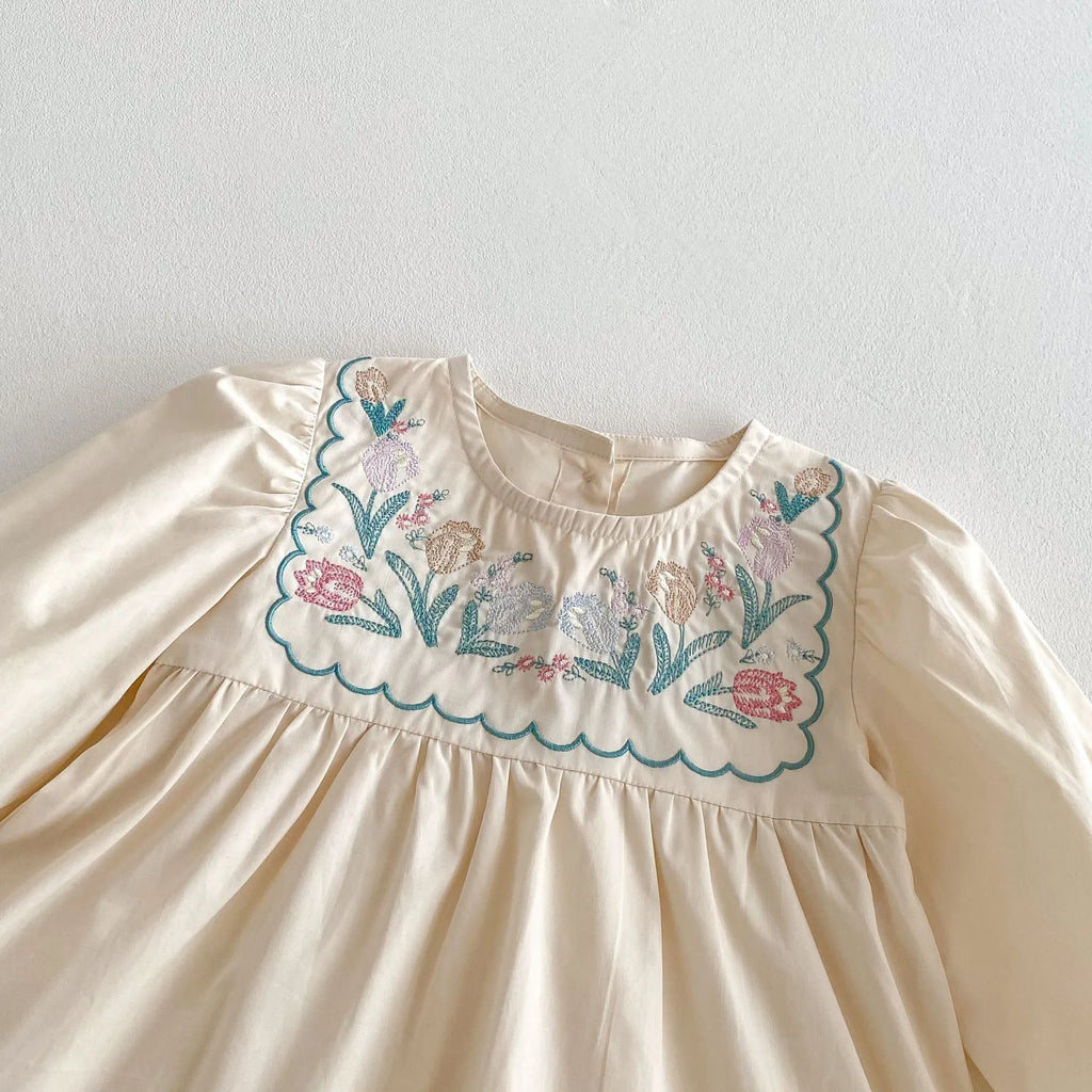 Girls' ruffled long sleeve flower embroidered princess dress in apricot colour on a child model