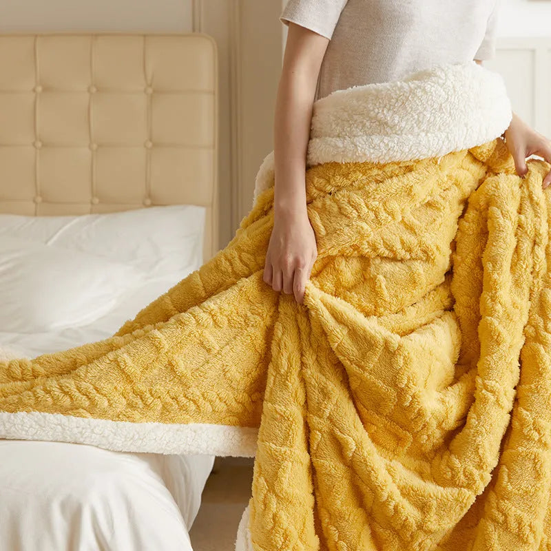 Polyester winter thermal flannel blanket in beige, laid flat showing its texture and simple modern style.