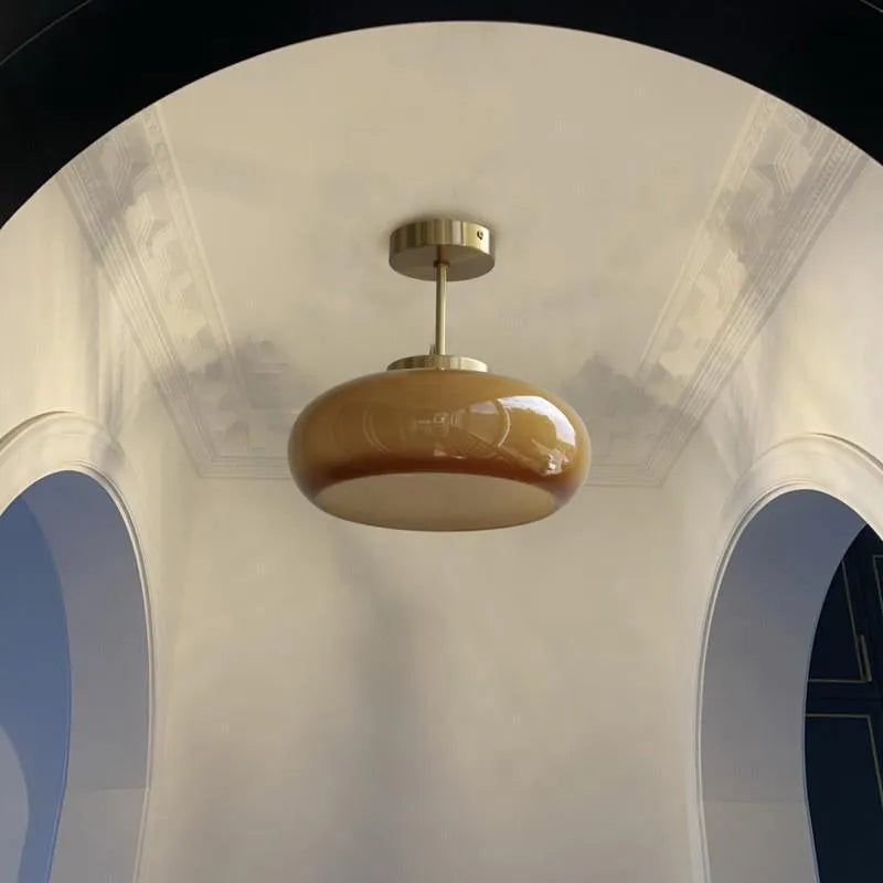 Three-headed egg tart pendant light with glass shades in a retro Bauhaus style.