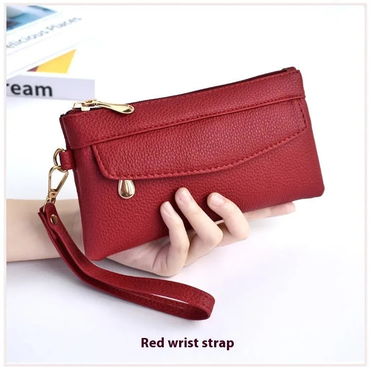 Soft PU leather crossbody bag in a square shape showing the internal sandwich zipper pocket.