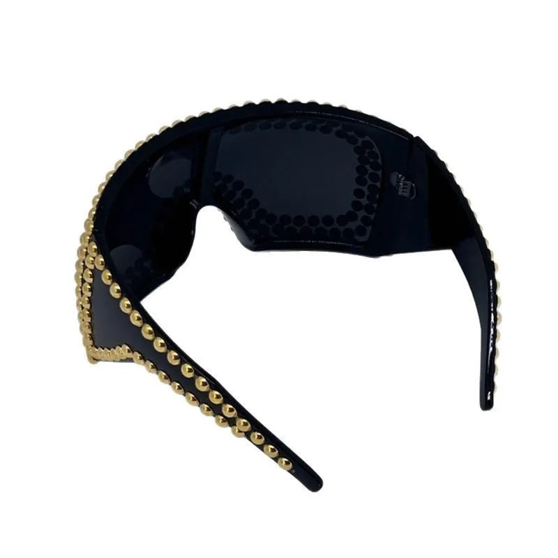 Men's square punk sunglasses with large 145mm frame and silver rivet details on a black background.