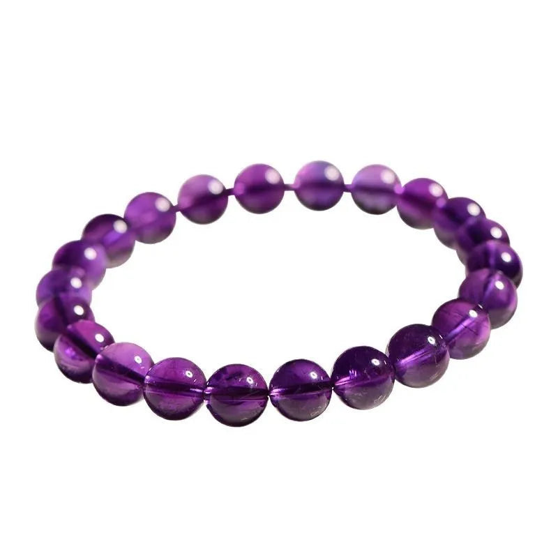 Natural amethyst Uruguay bracelet with polished purple beads, shown in single circle and triple ring designs.