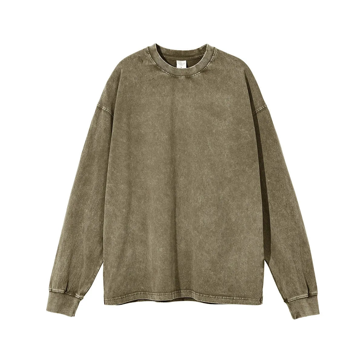Man wearing a loose-fit batik print long sleeve cotton pullover top in a vintage washed colour.