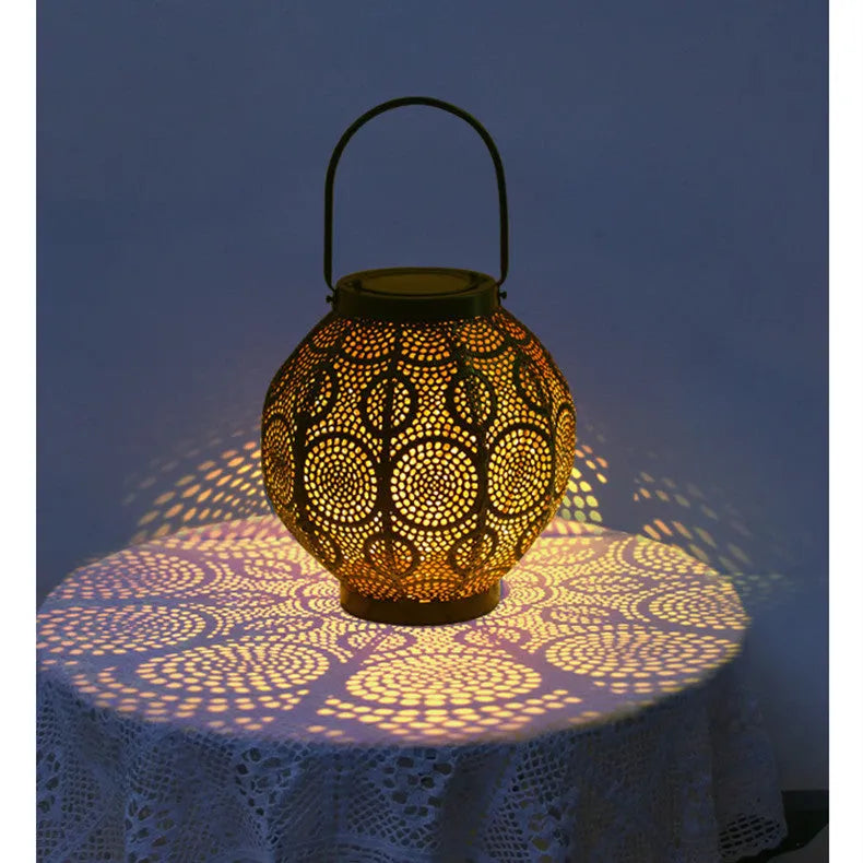 Solar-powered hollow decorative iron lamp for courtyard illumination