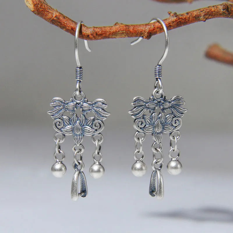 Pair of handmade 925 sterling silver koi earrings with silver colour and drop ear hook design