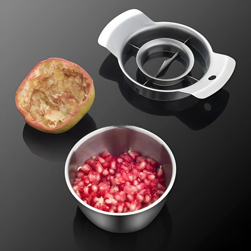 Stainless steel pomegranate fruit cutter tool with optional bowl and wooden hammer on a kitchen surface.