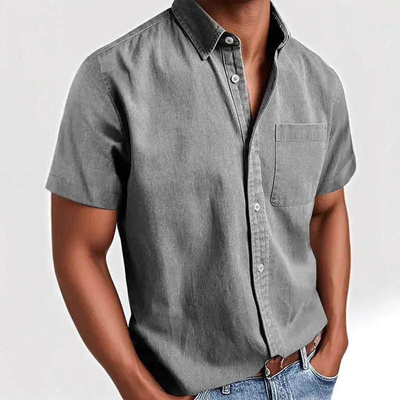 Men's solid colour short-sleeved polo shirt with a chest pocket on a hanger