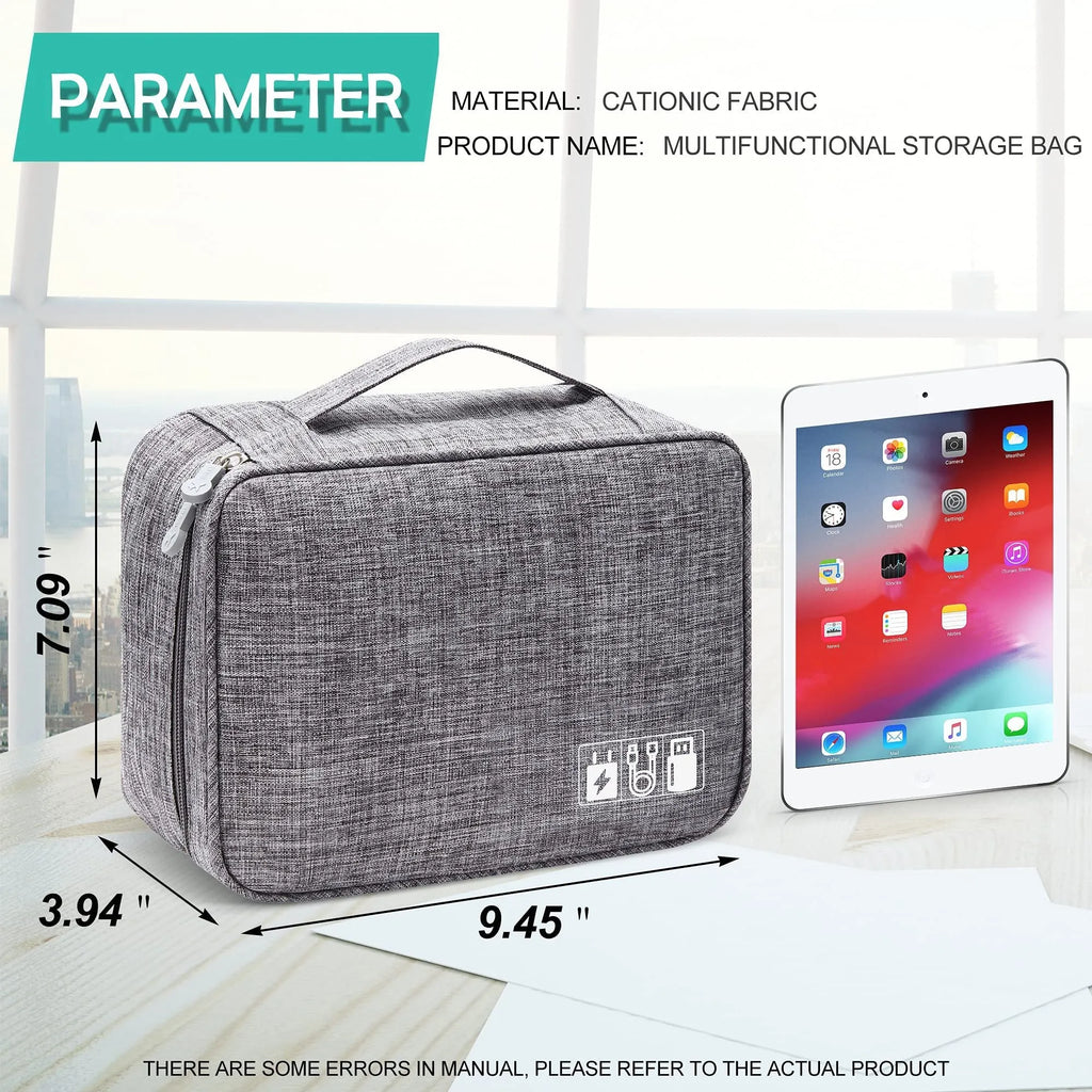 Black waterproof electronics organiser bag open, showing mesh pockets, elastic loops, and removable padded dividers inside.