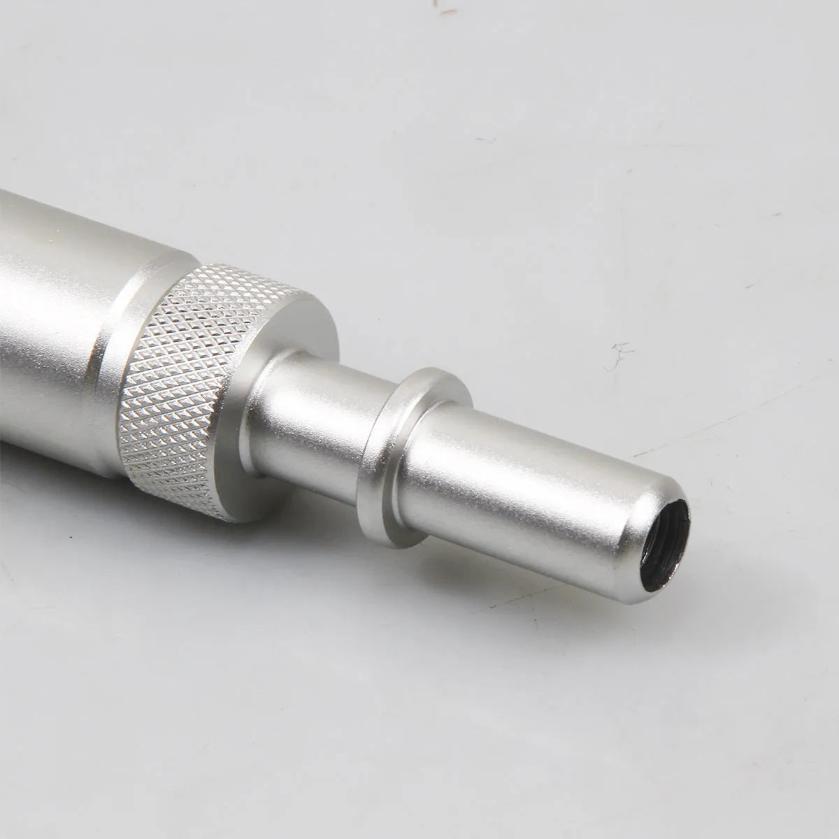Silver metal transmission refueling joint for VAS6262-9 adapter, weighing 500g.