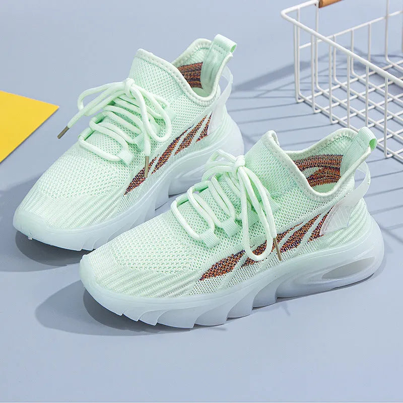Women's white cowhide leather high-top sports casual shoes with flat sole on a light background.