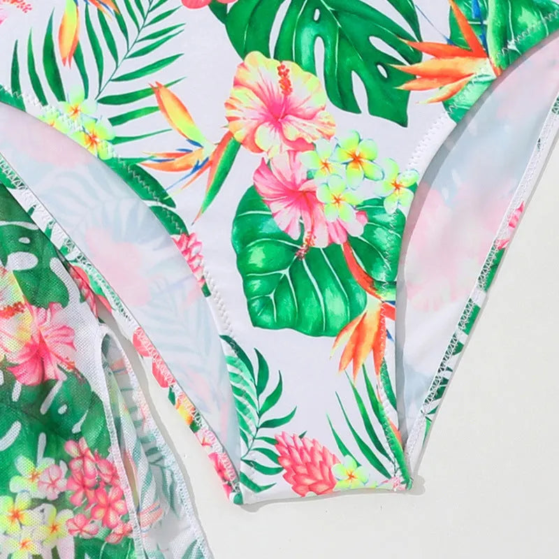 Girls' floral print three-piece swimsuit set with overclothes for swimming.