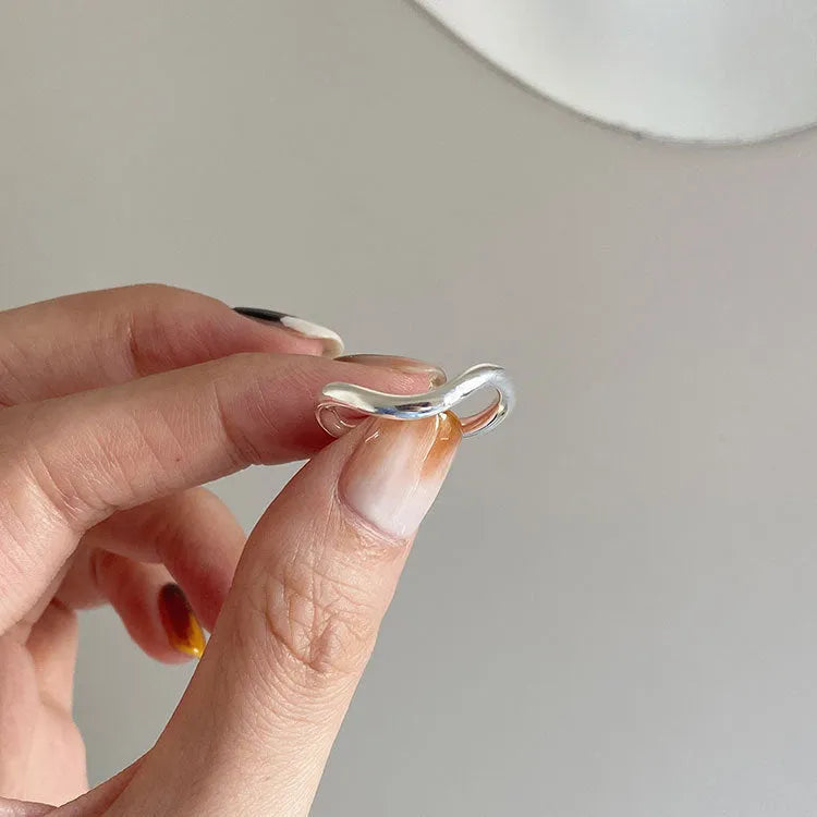 Women's 925 sterling silver irregular twisted wave line ring in plain silver with adjustable opening