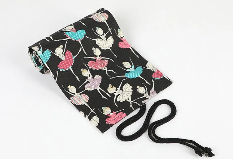 Canvas rolling pencil case with ballet girl print showing multiple pencil holes
