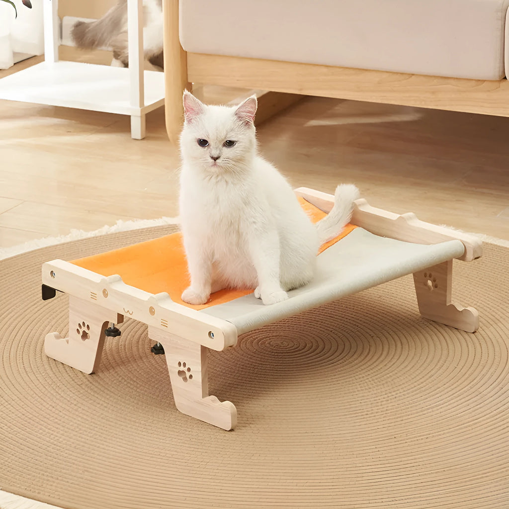 Wooden framed cat hanging hammock bed mounted on a window sill, available in seven style variations.