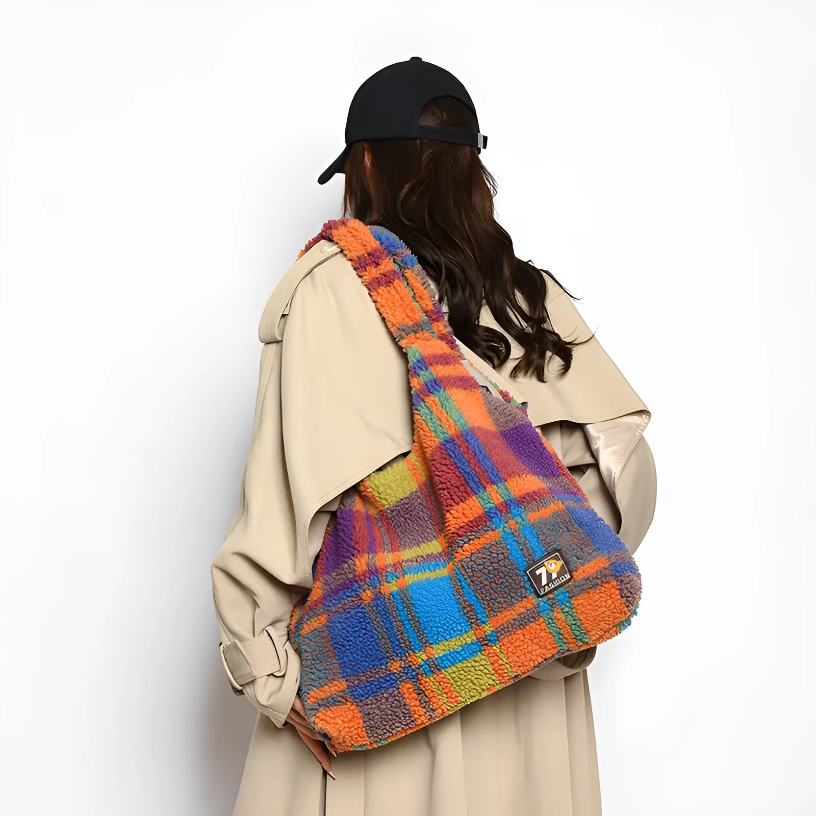 Women's plaid plush crossbody tote bag showing large capacity interior with zipper compartments