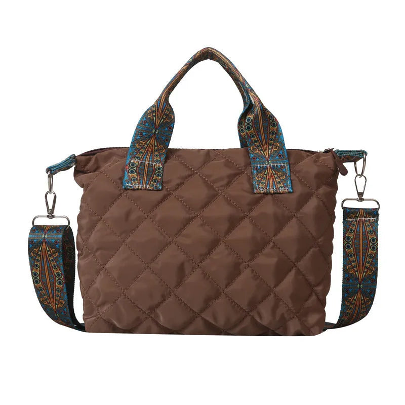 A soft Oxford cloth shoulder messenger bag in a horizontal square shape with embroidery detail.