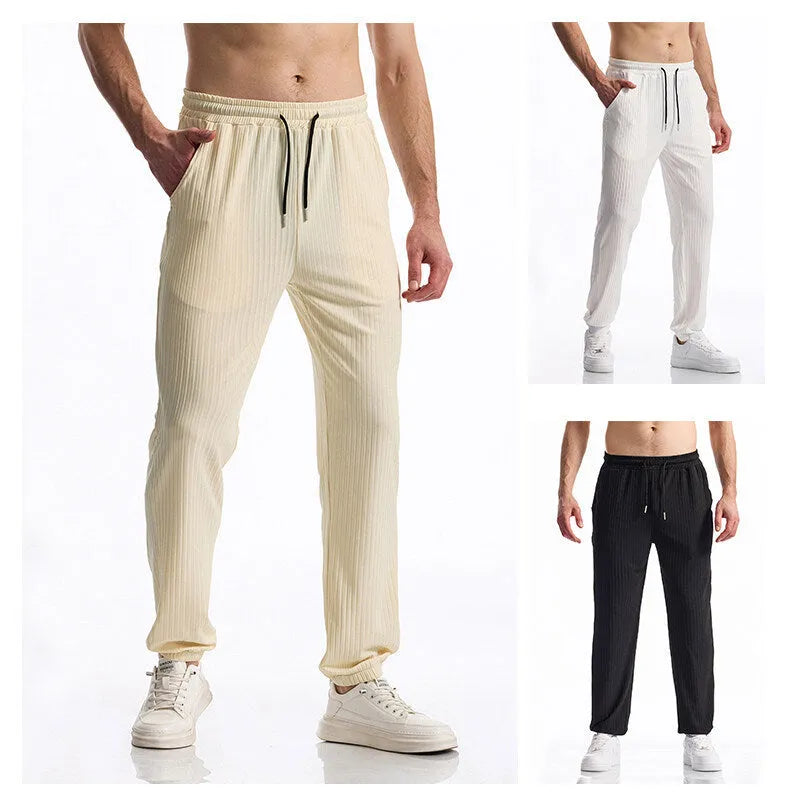 Silky rib fabric casual trousers with baggy straight-leg cut and elastic waistband