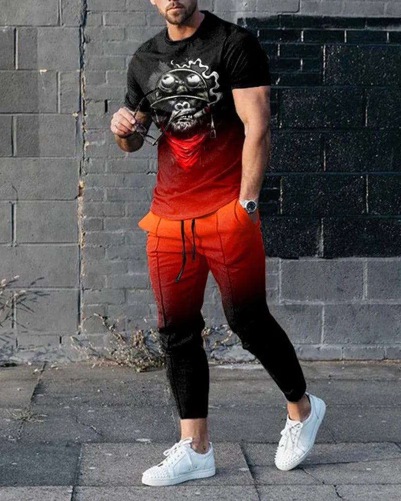 Men's thin short-sleeve printed pullover and matching trousers tracksuit set on a hanger.