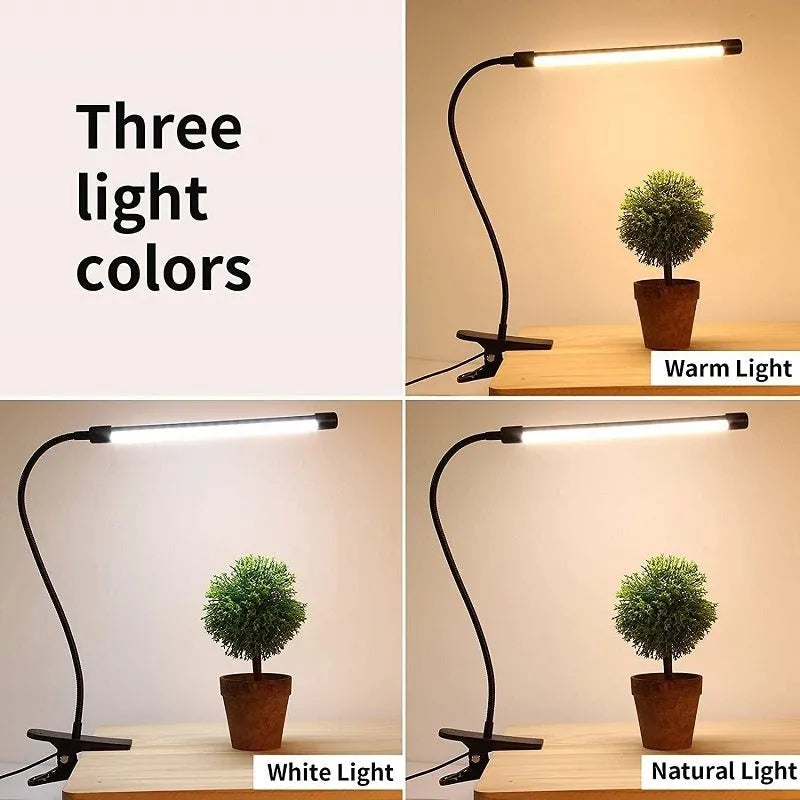 Black and white USB-powered LED desk lamp with flexible 26 cm gooseneck neck on a desk.