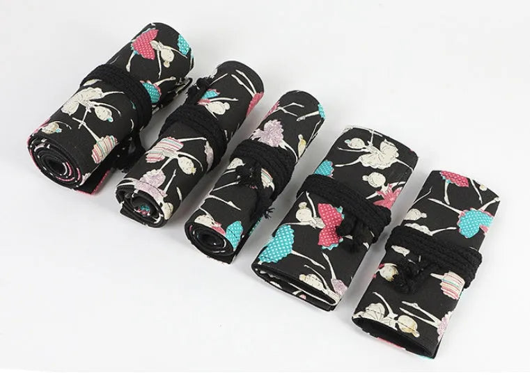 Canvas rolling pencil case with ballet girl print showing multiple pencil holes