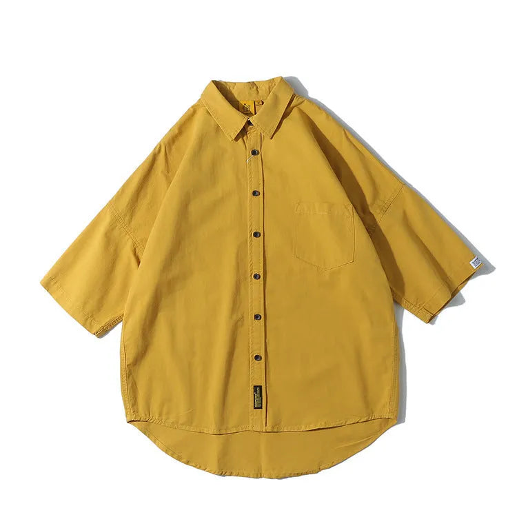Man wearing a loose-fit Japanese style cotton cardigan shirt in a summer colour.