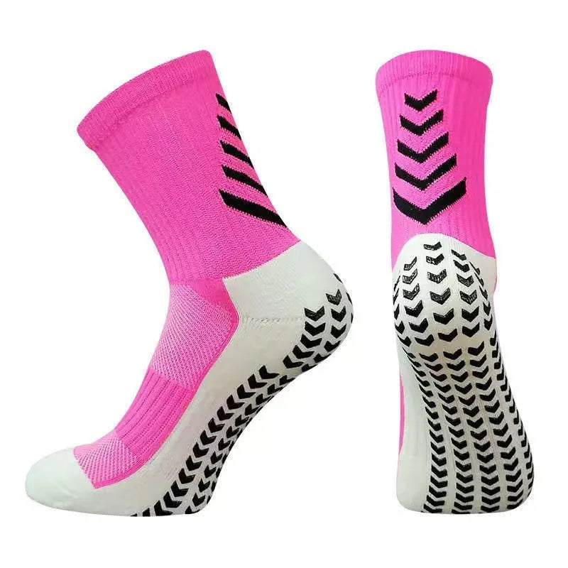 Men's black and green mid-calf athletic socks with a geometric pattern and non-slip silicone grip.