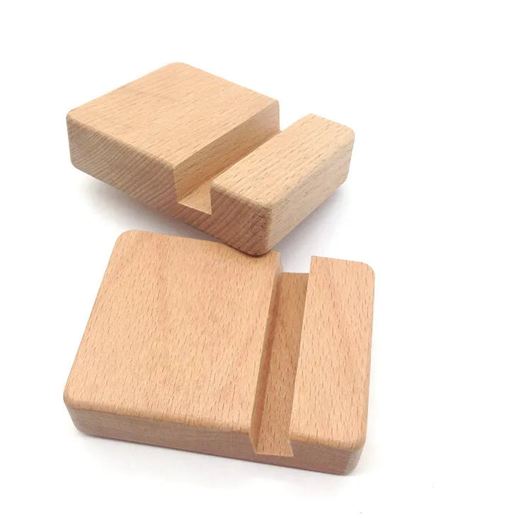 Handcrafted beech wood and resin lazy bracket mobile phone holder on a wooden desk
