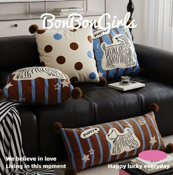 Blue cartoon animal printed sofa cushion pillow on a grey sofa