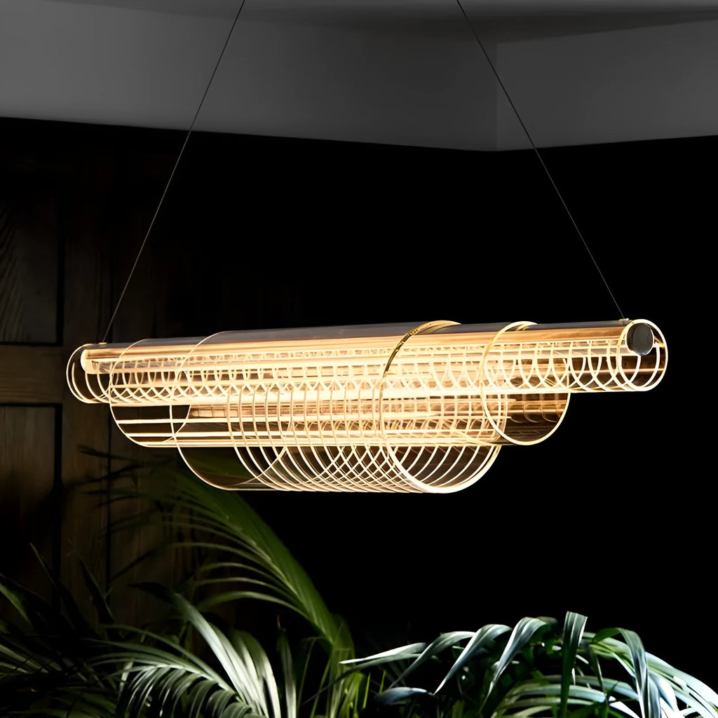 Modern clear glass pendant lamp with iron fittings hanging from a ceiling.