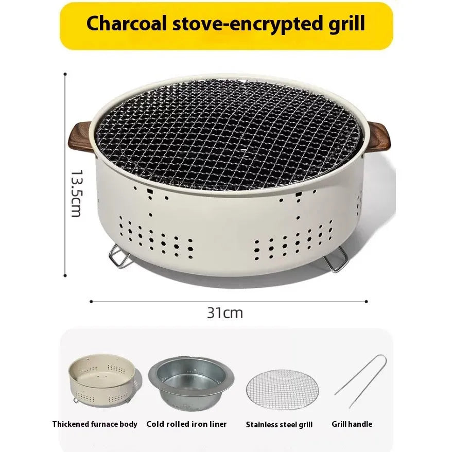 Compact round indoor charcoal stove with removable metal grill rack, for smokeless tabletop cooking.