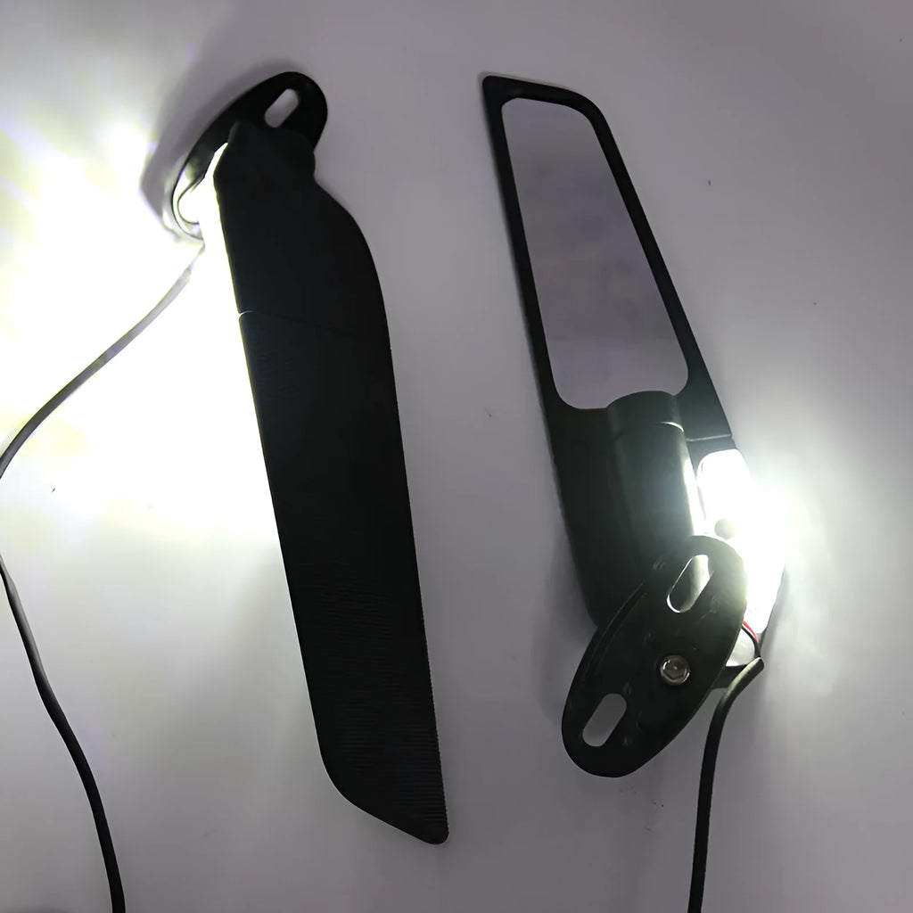 Pair of yellow motorcycle rearview mirrors with integrated running reflectors, showing convex glass lens and aluminium housing.