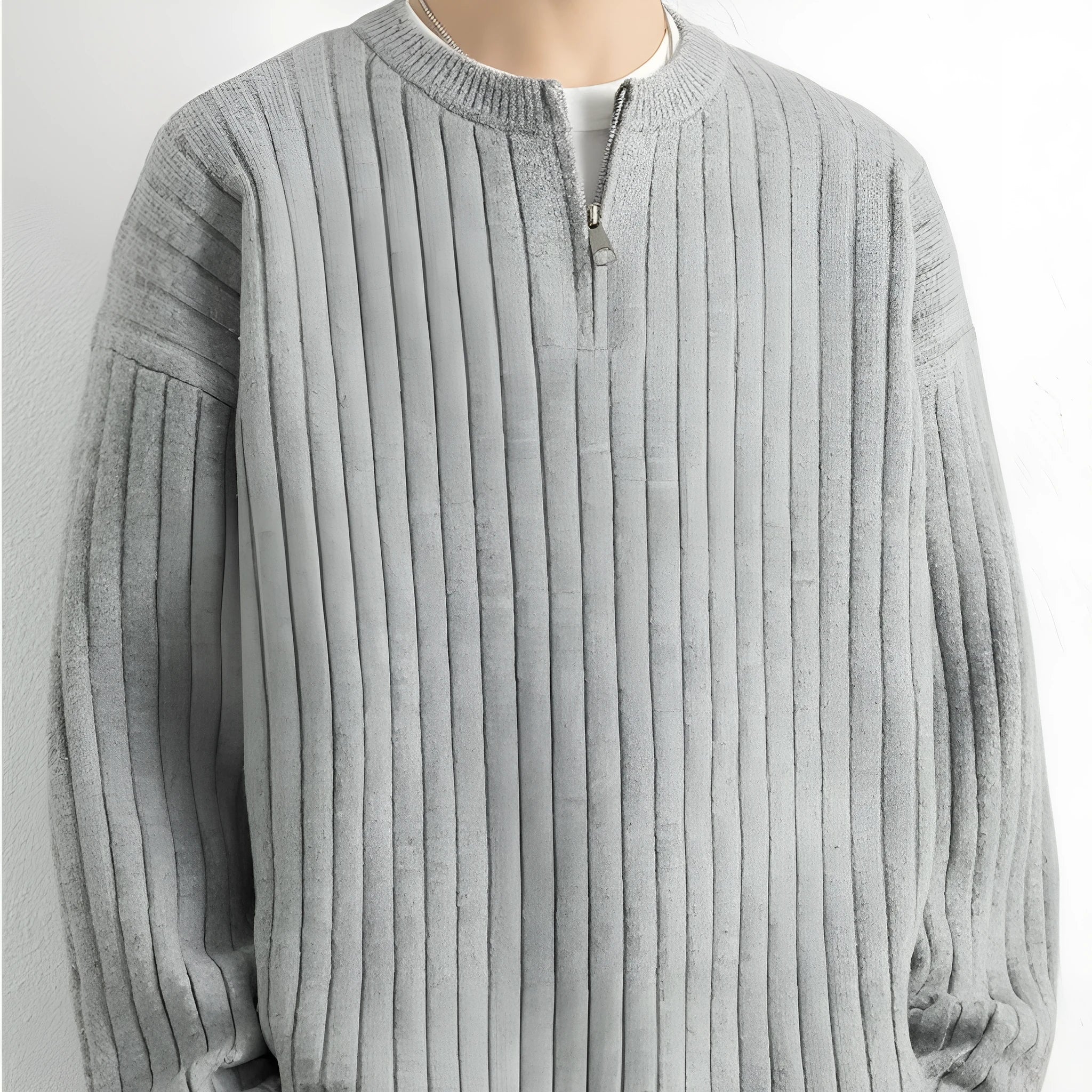 Grey men's loose fit half zip pullover sweater with textured knit and long sleeves.