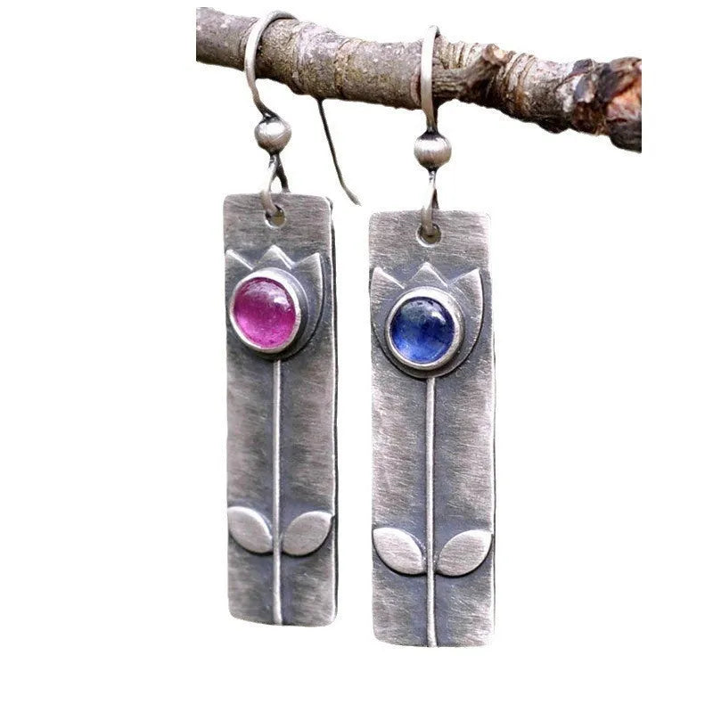 Geometric ellipse earrings with antique red sapphire finish and electroplated metal construction