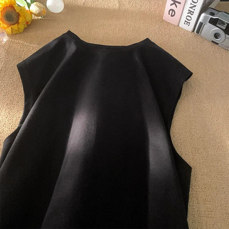 Men's loose solid colour cotton tank top on a hanger, showing straight hem and sleeveless design.
