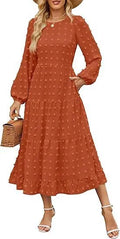 Women's beige long sleeve casual dress with high waist and ruffle sleeves on a model.
