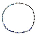 Blue hand-woven bracelet made from crushed Fang Hui stone and gold obsidian with geometric shapes