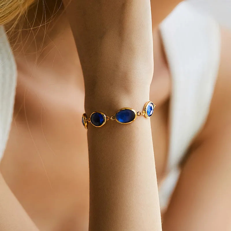 Women's geometric ellipse bracelet with glass inlay accents on copper base in blue, green, and multicolor options