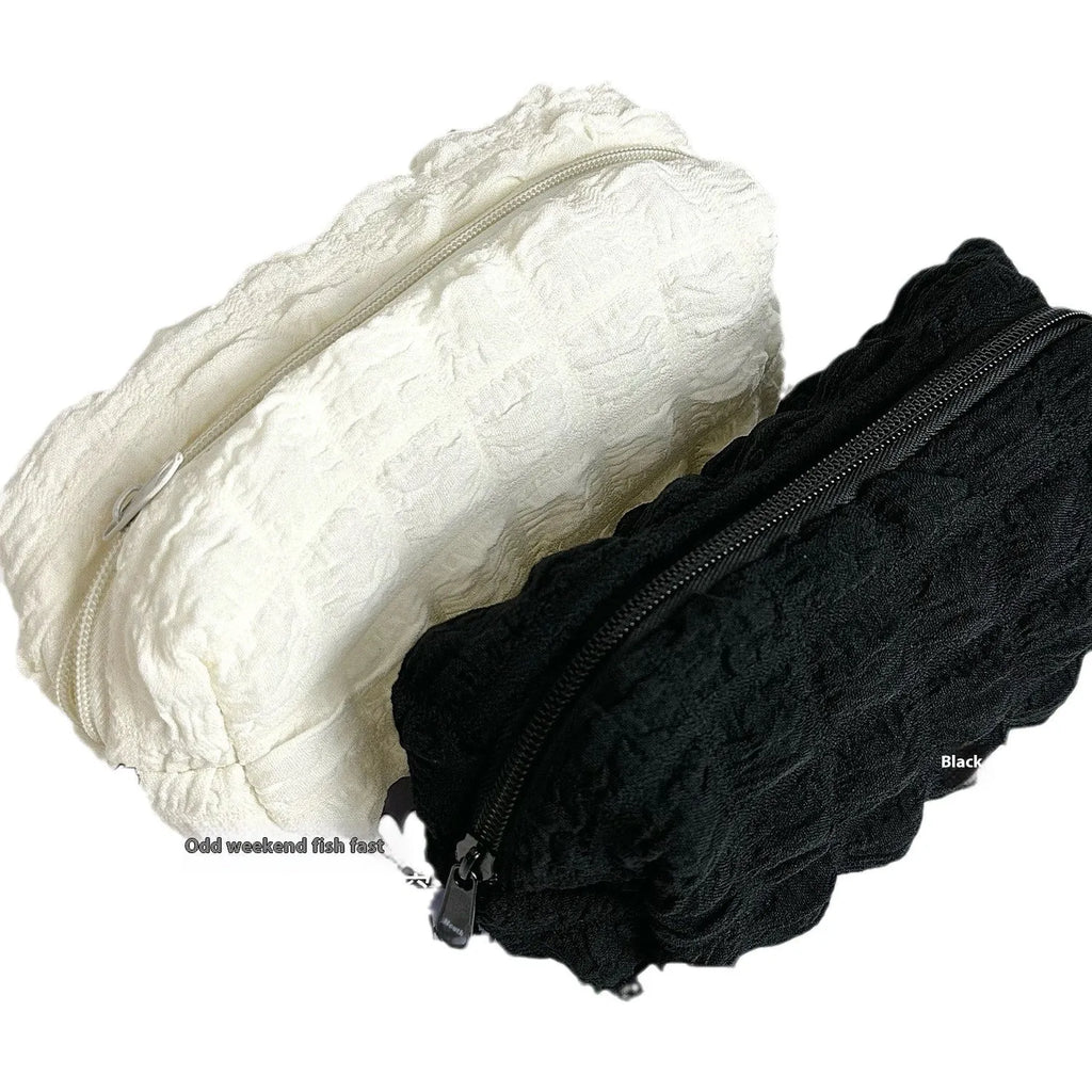 Fabric pencil case with cream puff design in beige and black colour options