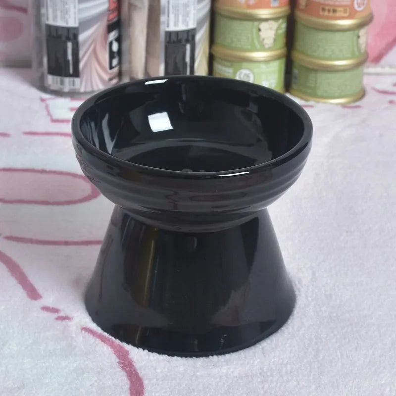 White ceramic pet bowl with a high foot neck and slanted rim for cat or dog feeding