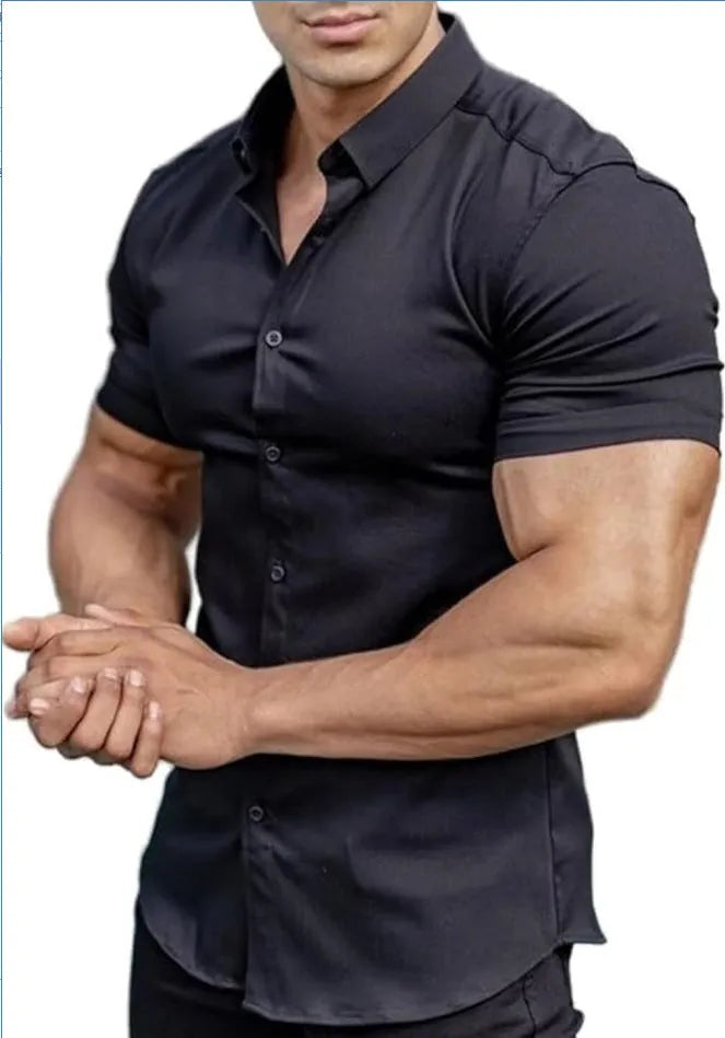 Man wearing a brown short sleeve printed casual shirt with a collar.