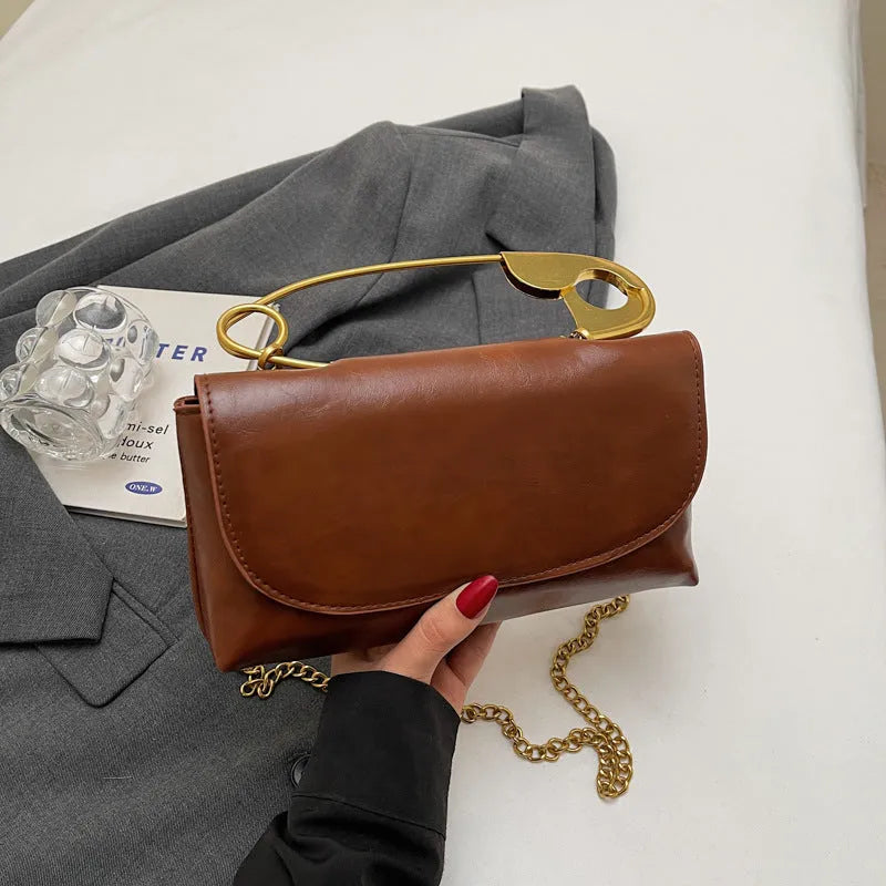 Creative paper clip design PU leather shoulder handbag in horizontal square shape with sandwich pocket