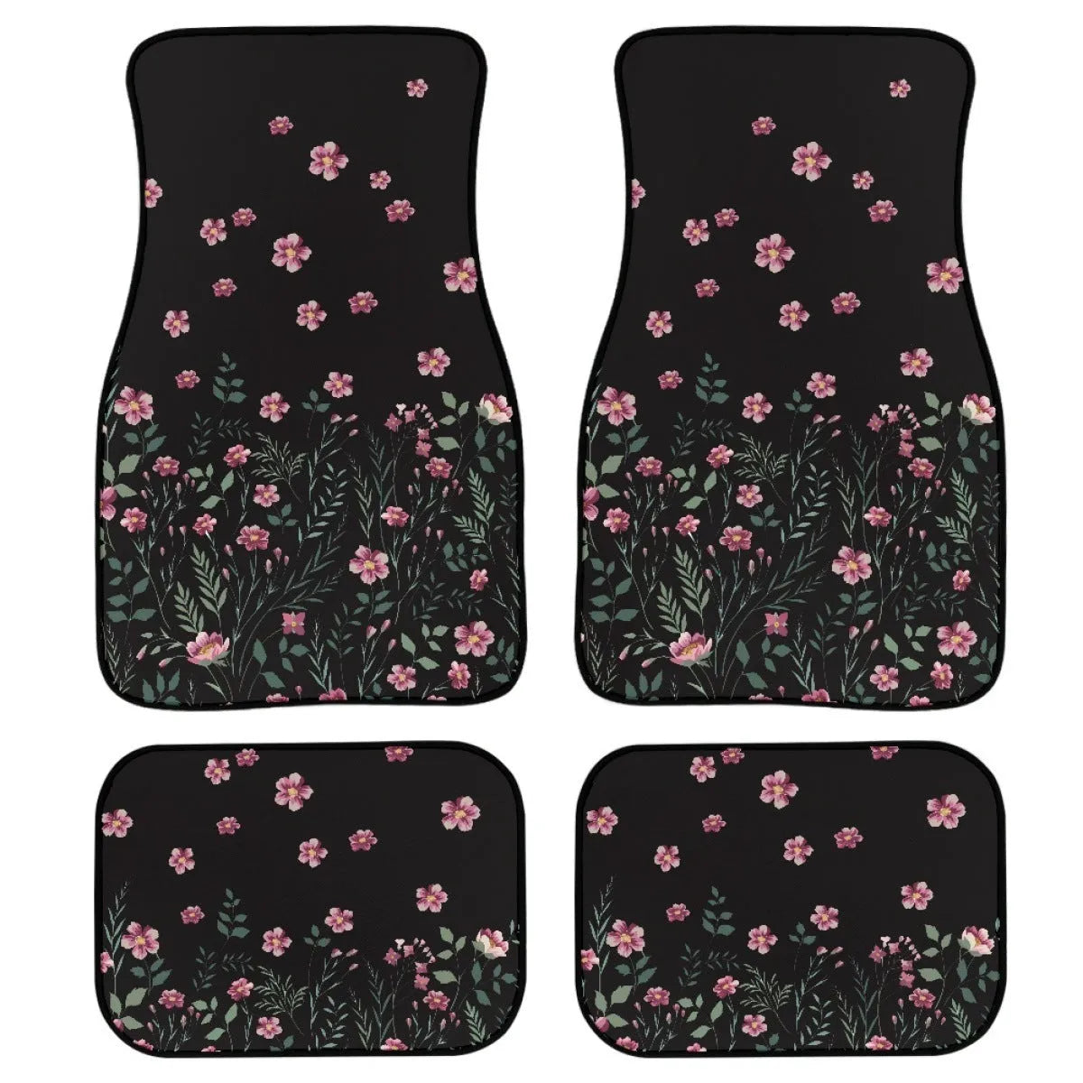 Set of four black rubber car floor mats with a textured surface and raised edges, shown in a vehicle footwell.